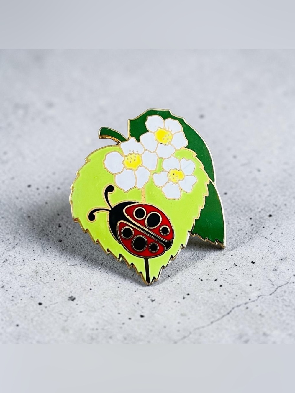 Hallmark Green Leaf Brooch with Red Ladybug and White Flowers